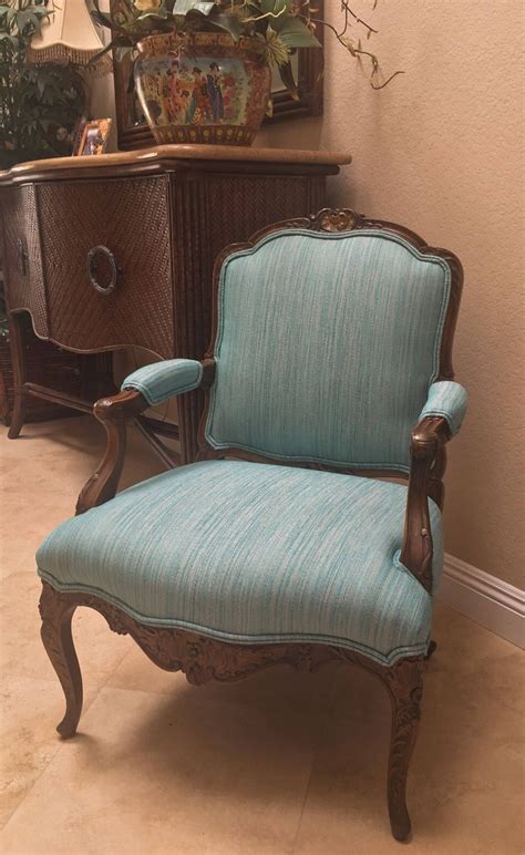 Look for bold forms, chunky hardware, recovered finishes and natural elements and textures in neutral palettes. French Fauteuil Style Accent Chair with Aqua Fabric..French Farmhouse Chair...Country French ...