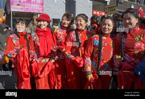 Six Women Of Various Ages In Colorful Costumes At The Chinese New Years