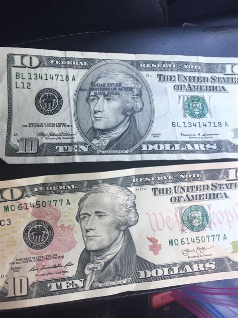 Two Bills Are Sitting Side By Side On The Back Seat Of A Car One Is
