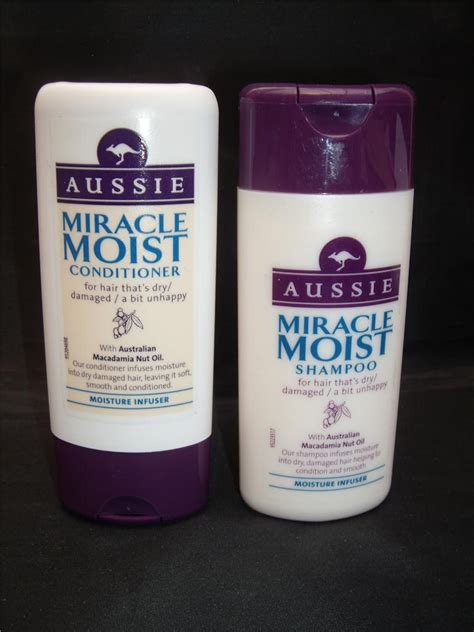 It softens, hydrates, repairs damage throughout use, and tames frizz. AUSSIE MIRACLE MOIST SHAMPOO AND CONDITIONER FOR DRY ...