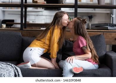 Two Lesbians Kissing While Sitting On Stock Photo 1461093848 Shutterstock