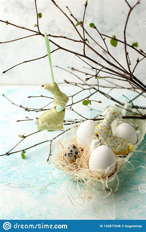 Easter Scene With Spring Fresh Greenery Branches Rabbit And Nest Of