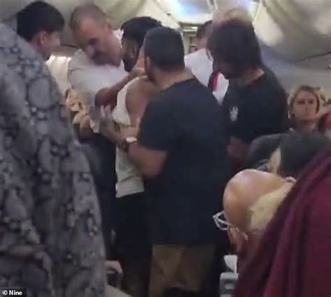 qantas passenger is detained on flight between bali and melbourne after attacking cabin crew