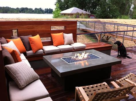 If you're adding to your outdoor space, it's hard to go wrong with a fire pit table set as a centerpiece for your patio furniture. Contemporary Deck with Pathway & Fire pit | Zillow Digs ...