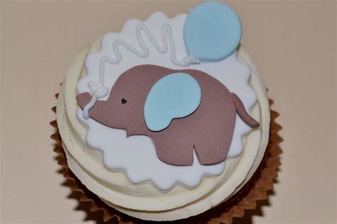 We played these games at our party Baby elephant cupcakes | Elephant cupcakes, Baby shower cupcakes, Elephant cakes