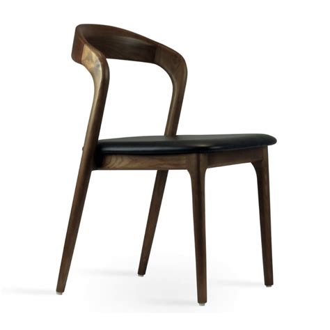 Simple, light and elegant wood chair. Industrial Modern Infinity Solid Wood Dining Chair | Wayfair