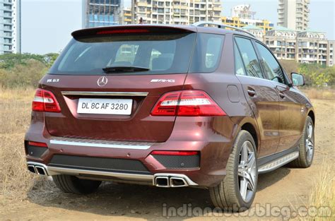 At about twice the cost of a base ml350, the ml63 amg requires a big outlay to enjoy its prodigious power and exclusivity. Mercedes-Benz ML 63 AMG Review rear three quarter angle