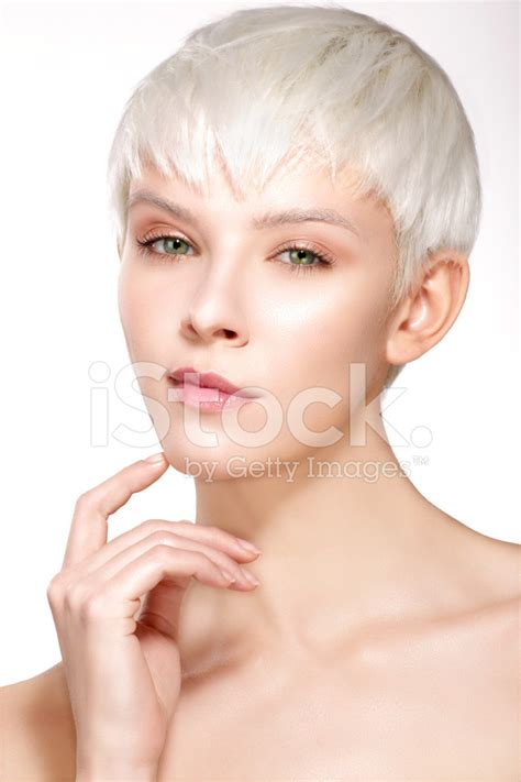 Beauty Model Blonde Short Hair Showing Perfect Skin Stock Photo