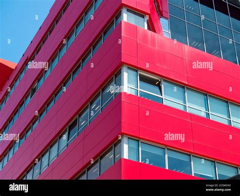 Red Modern Office Building With Open One Windows Stock Photo Alamy