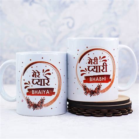 Send Set Of Bhaiya Bhabhi Rakhi With Green Tea Mugs N Chocolates Online