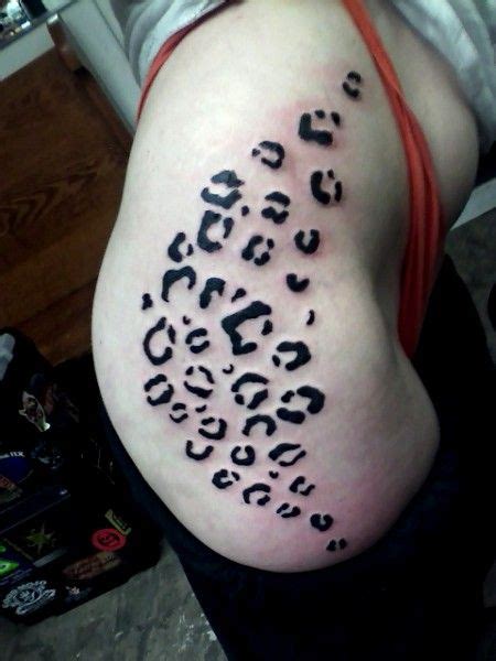 Cheetah Print Tattoos On Hip And Thigh