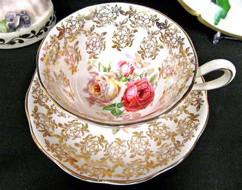 royal-albert-tea-cup-and-saucer-chintz-roses-and-gold-gilt