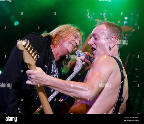 Phil Collen And Joe Elliott With Def Leppard Perform In Concert At The