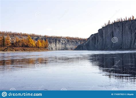 Autumn On The Taiga Siberian River During Rafting With Fishing Stock