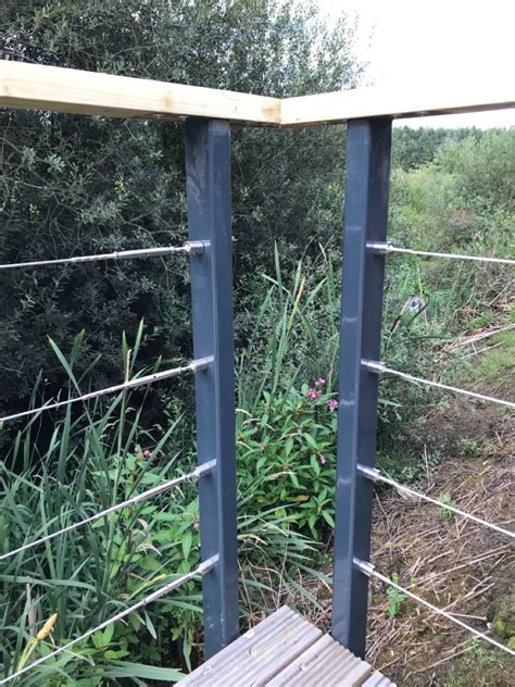 Design your handrail system with the existing conditions in mind. Steel decking handrail with wires in 2020 | Deck handrail ...