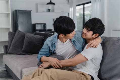 Free Photo Young Asian Gay Couple Hug And Kiss At Home Attractive Asian Lgbtq Pride Men Happy