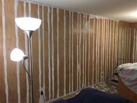 How To Paint Over 1970 S Fake Wood Paneling In 4 Simple Steps Painting Wood Paneling Wood