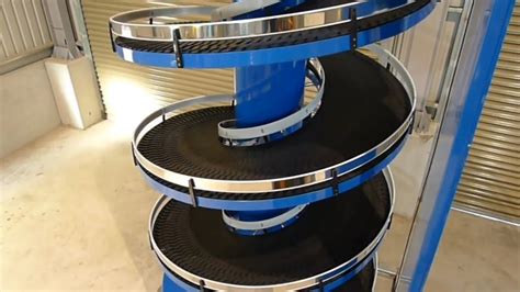 Nexus Gravity Roller And Motorized Spiral Conveyor Carton Handling