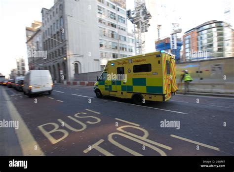 London Ambulance Service Vehicle Speeding Through Streets Of The City