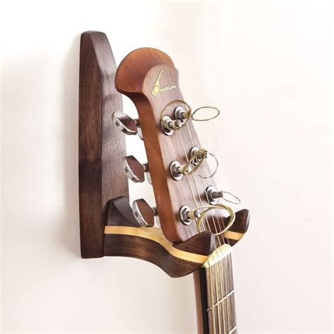 Align the top corners of the rests with the … Wooden Guitar Wall Hanger | dotandbo.com | Guitar wall ...