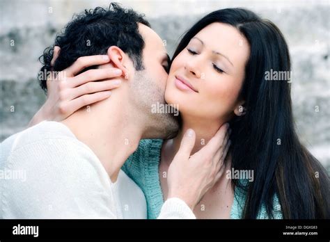 Guy Kissing Girlfriend Neck