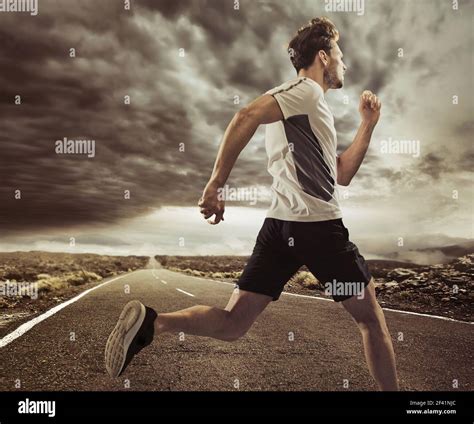 Portrait Of A Young Runner In An Expressive Pose Stock Photo Alamy