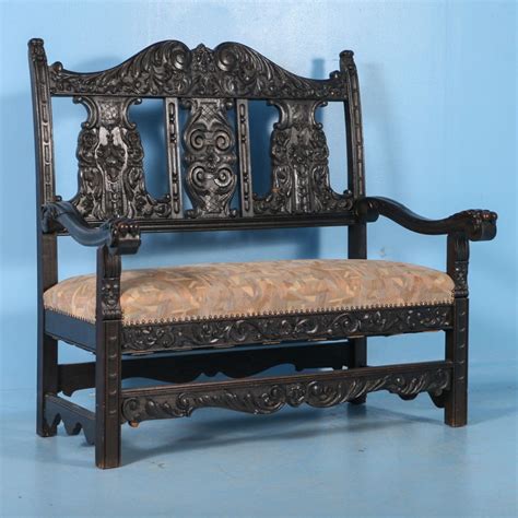 carved antique  century italian upholstered oak bench painted black