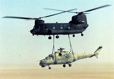 A Ch 47 Chinook Carrying A Downed Hind During Operation Mount Hope Iii