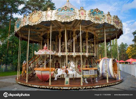 Old Vintage Carousel Attraction In The Park Stock Photo By