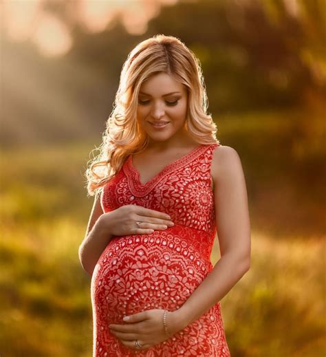 Sexypregnantladies A Beautiful Blonde Pregnant In Red After