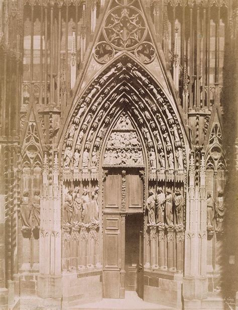 An Old Black And White Photo Of The Entrance To A Cathedral