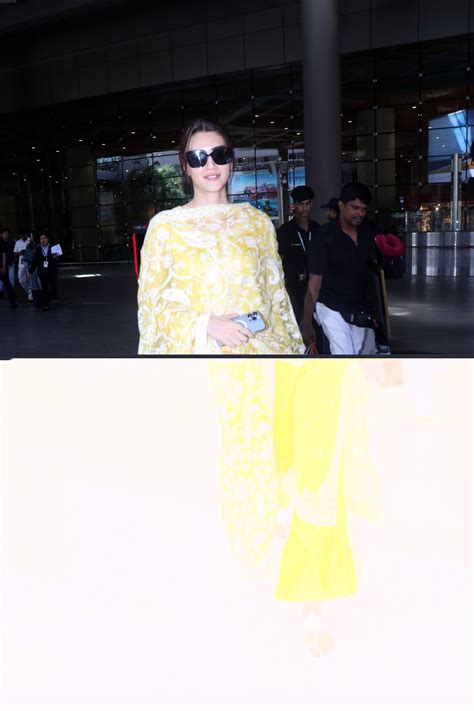 Kriti Sanon Dressed In Yellow Churidar Wearing Black Sunglasses Kriti Sanon Bollywood Photos