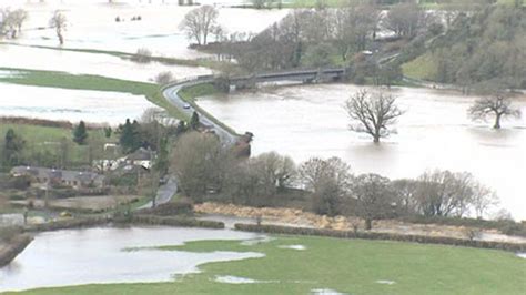 wales storm flooding and travel disruption bbc news