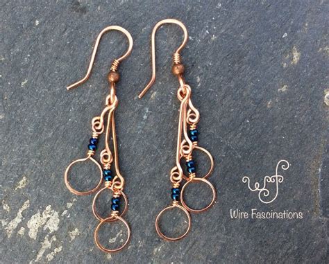 Handmade Copper Earrings Long Circle Dangles With Metallic Blue Beads