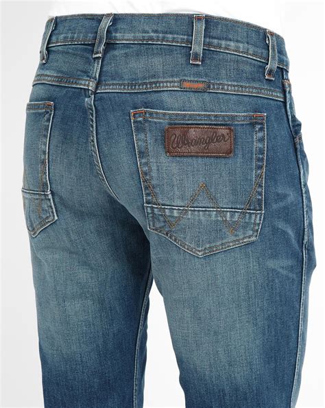 Wrangler Blue Washed Tapered Thermo Light Jeans In Blue For Men Lyst