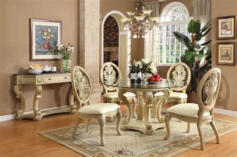 Circular designs accent the round drum table base. Glass Top Classic Coronado Dining Table w/Options By Acme