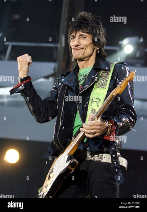 Rolling Stones Guitar Player Ron Wood Rocks On The Stage During The