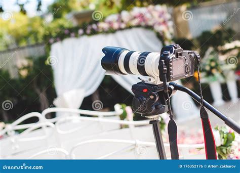 The Work Of Photographer And Videographer At The Wedding The Camera