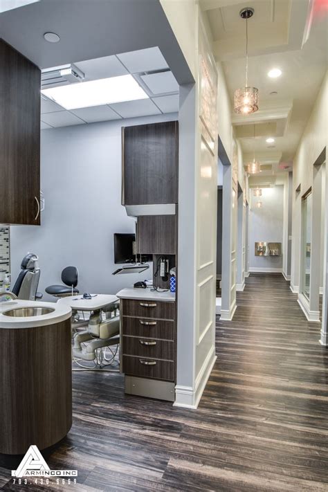 Paneled Hallways And Organic Light Fixtures Dental Office Design By