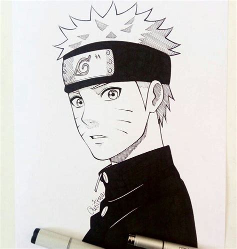 A Drawing Of Naruto Is Shown On A Piece Of Paper Next To A Marker