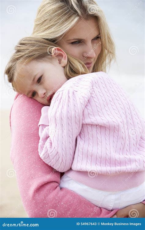 Mother Cuddling Young Daughter Outdoorsoutside Stock Image Image Of Female Smiling 54967643