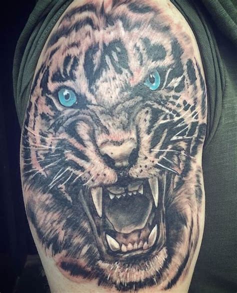 Share 73 Tiger With Blue Eyes Tattoo Super Hot Incdgdbentre