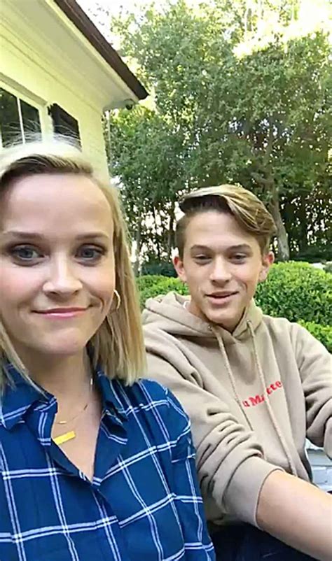 reese witherspoon s son deacon teaches her to make tiktok video us weekly