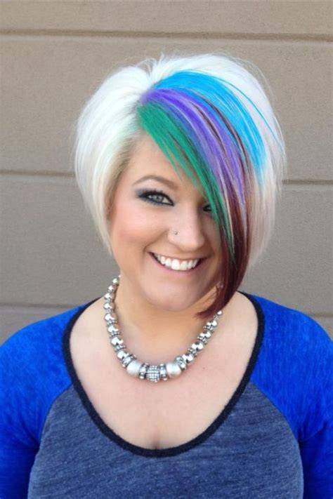 Platinum hair is in demand! Green purple and blue peacock hair. Platinum blonde ...