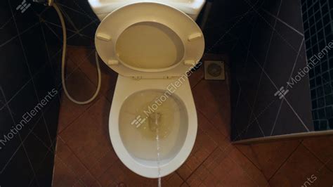 Point Of View Man Pee In The Toilet At Home Urinal In Restroom Flushed