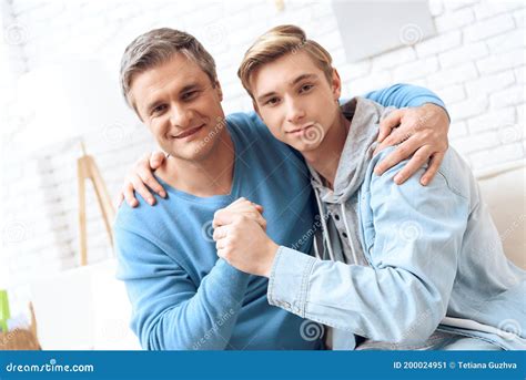 Father And Son Embrace Each Other Stock Image Image Of Angry