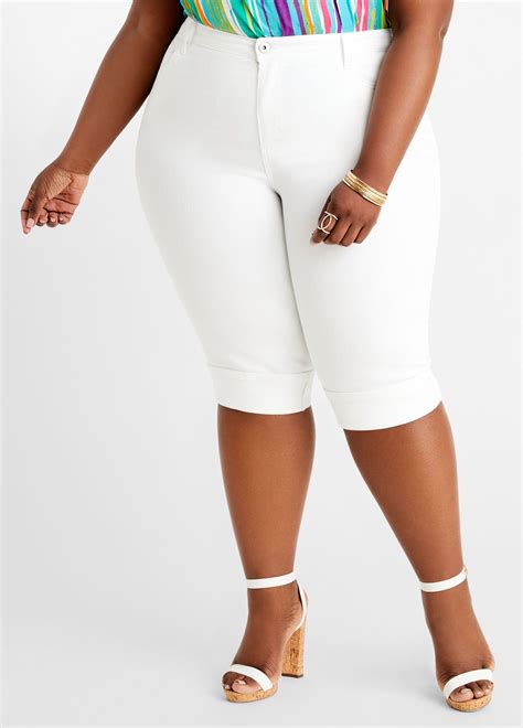 complete with a wide roll cuff these plus size denim capris will skim the tops of your favorite