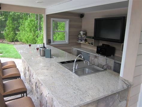 Jeff wortham & associates topped this kitchen in pleasanton, california, with tile and gave the countertop a double bullnose edge for a classic look. Outdoor Kitchen Granite Countertops Design — Randolph ...