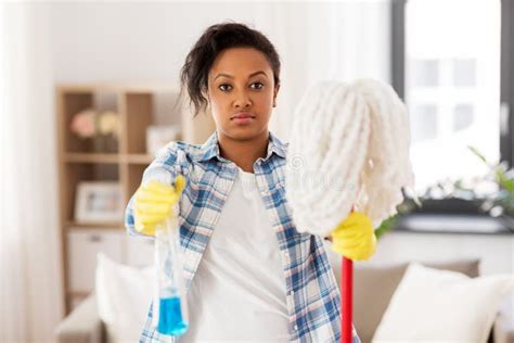 African American Woman With Mop Cleaning At Home Stock Image Image Of