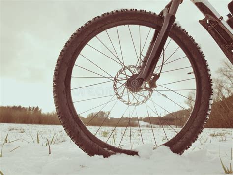 Winter Mtb Riding In Snowy Country Low Ankle View To Wheel With Snow